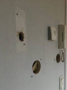 Inkomhal gang appartement woning laten schilderen prijzen Genk Limburg voor